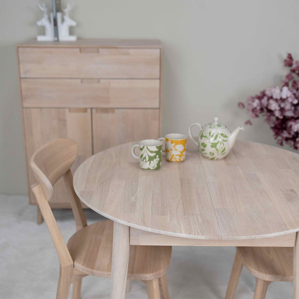 Mesa de comedor redonda y extensible de madera maciza de roble Escandi 3, 100-130 x 100 x 75 cm. | NordicStory