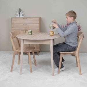 Mesa de comedor redonda y extensible de madera maciza de roble Escandi 3, 100-130 x 100 x 75 cm. | NordicStory