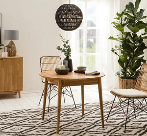 Escandi 6 round extendable dining table in solid oak | NordicStory