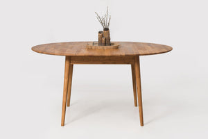 Escandi 6 round extendable dining table in solid oak | NordicStory