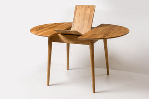Escandi 6 round extendable dining table in solid oak | NordicStory