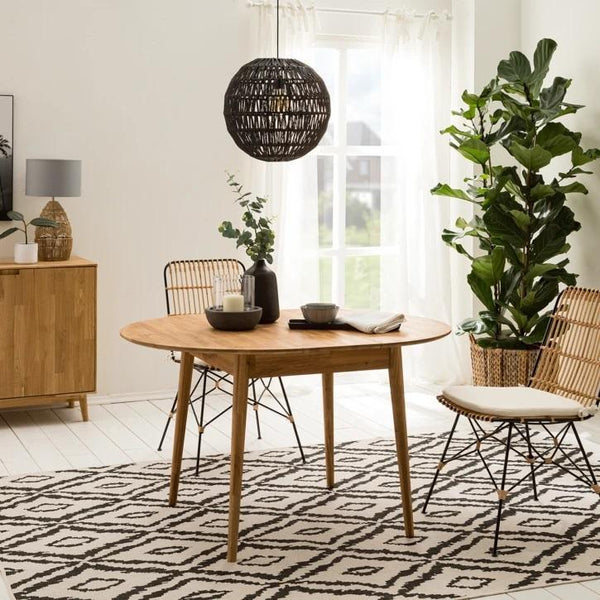 Escandi 6 round extendable dining table in solid oak | NordicStory