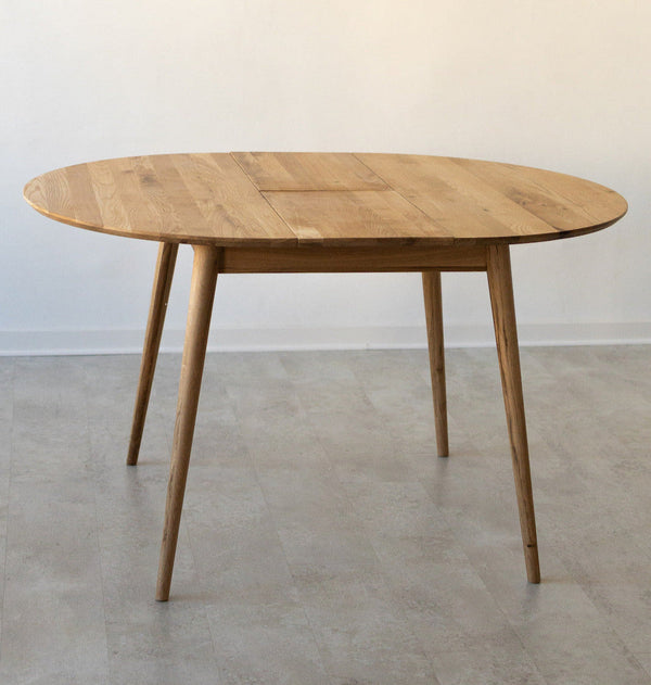 Mesa de comedor redonda y extensible de madera maciza de roble Escandi 3, 100-130 x 100 x 75 cm. | NordicStory