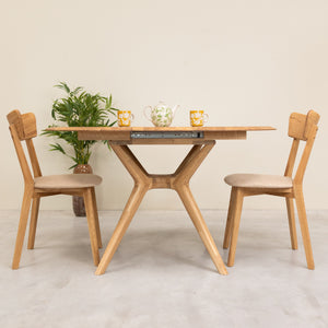 Mesa de comedor redonda y extensible de madera maciza roble Carmen | NordicStory