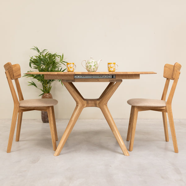 Mesa de comedor redonda y extensible de madera maciza roble Carmen | NordicStory